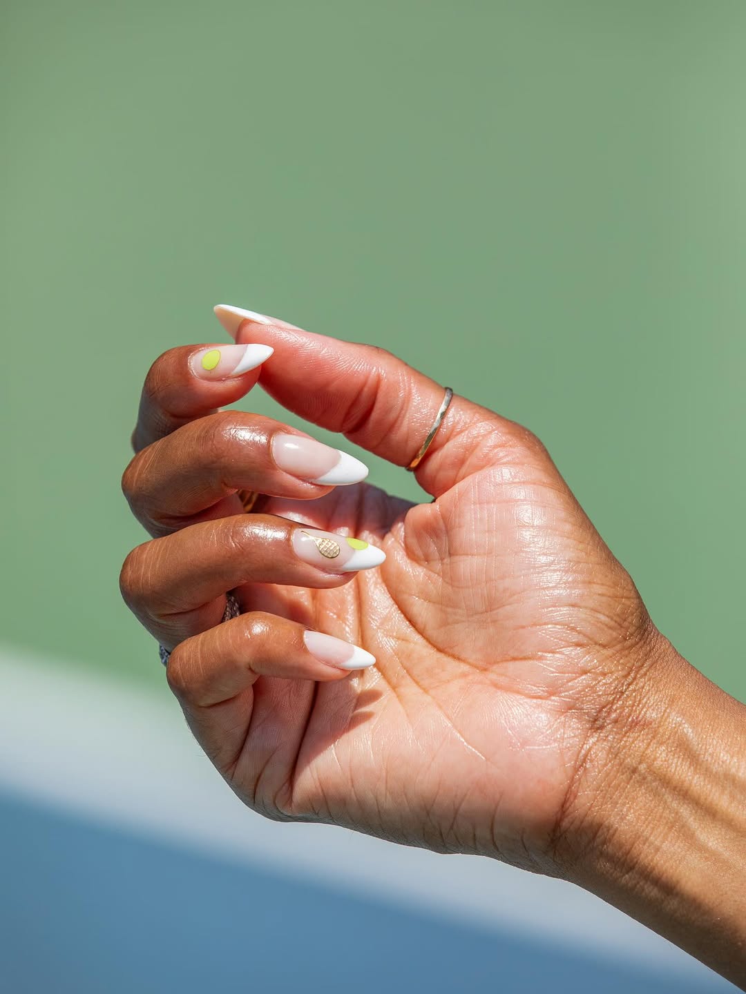 A tennis inspired manicure by The Mani Club