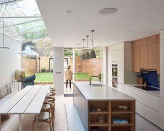 Light and airy kitchen extensions leading to garden