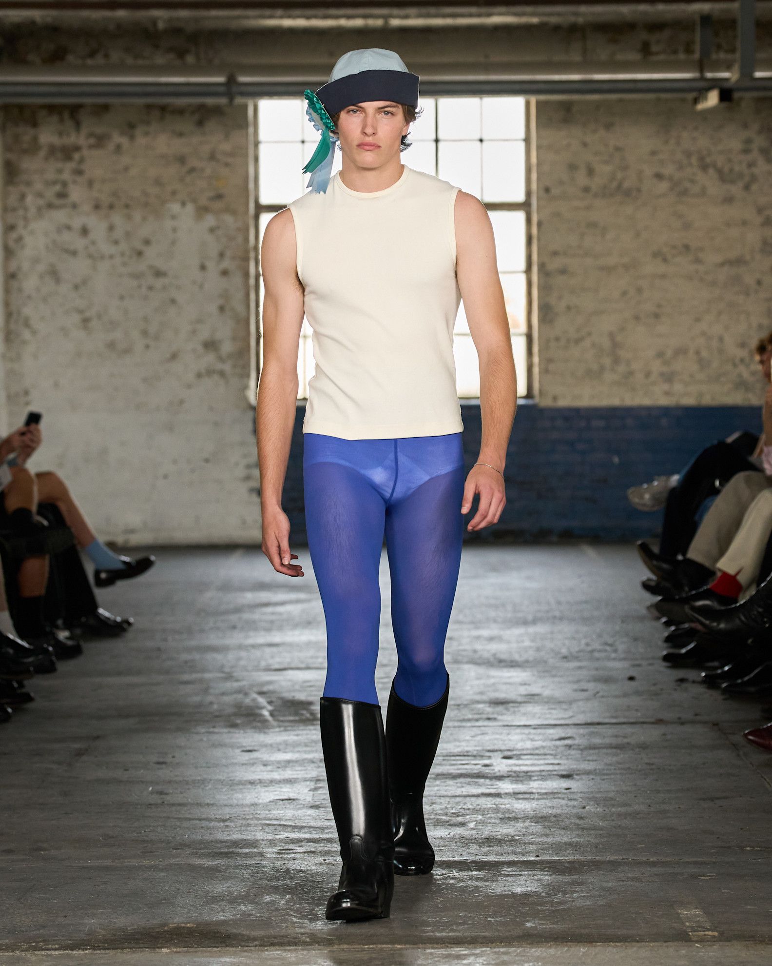 An image of the colourful menswear accessory trend, as spotted on the Geordie Campbell spring/summer 2027 runway at London Fashion Week.