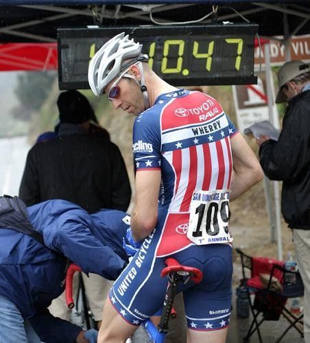 Wherry checks his bike