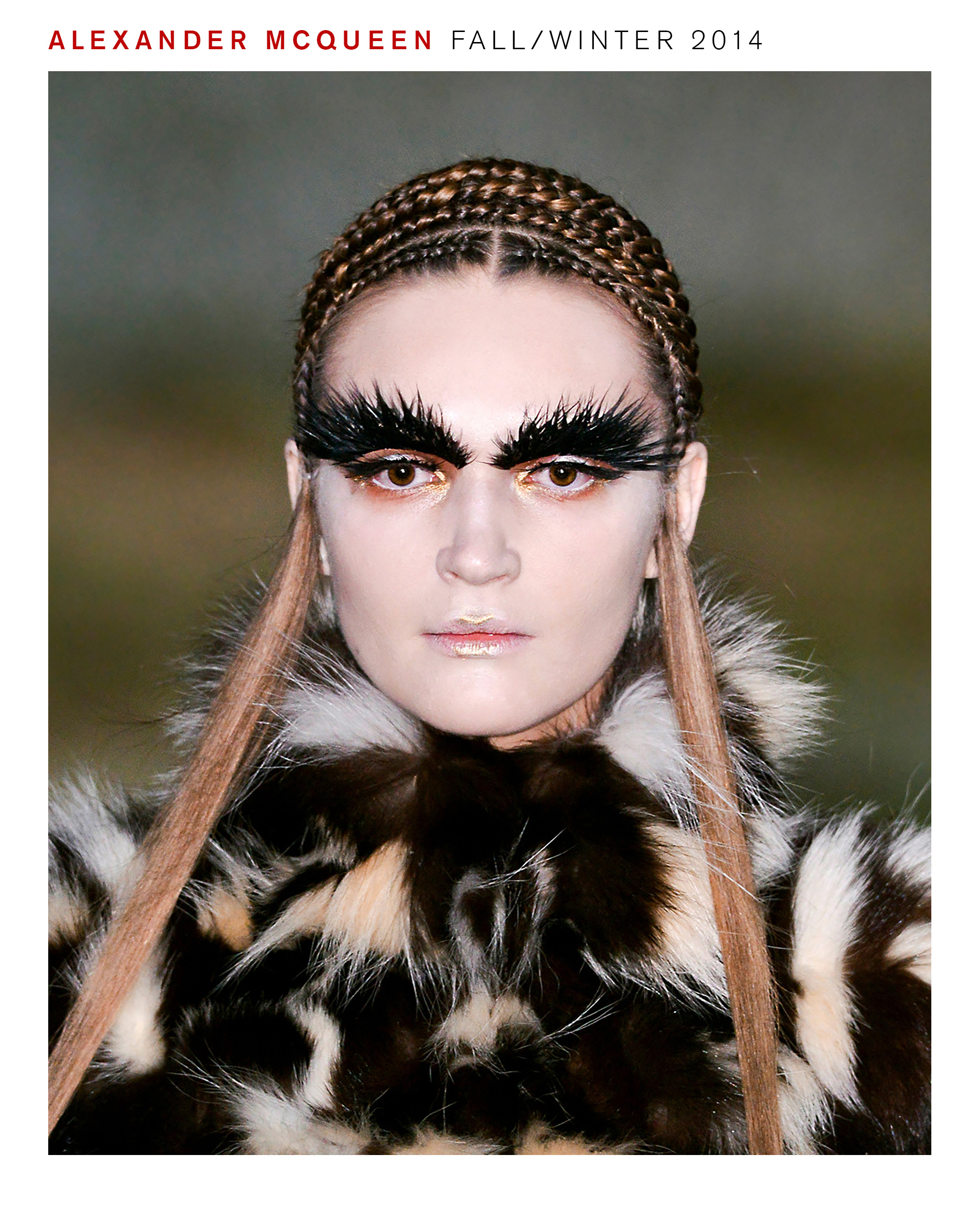 Model wearing Pat McGrath makeup look for Alexander McQueen fall/winter 2014 show.