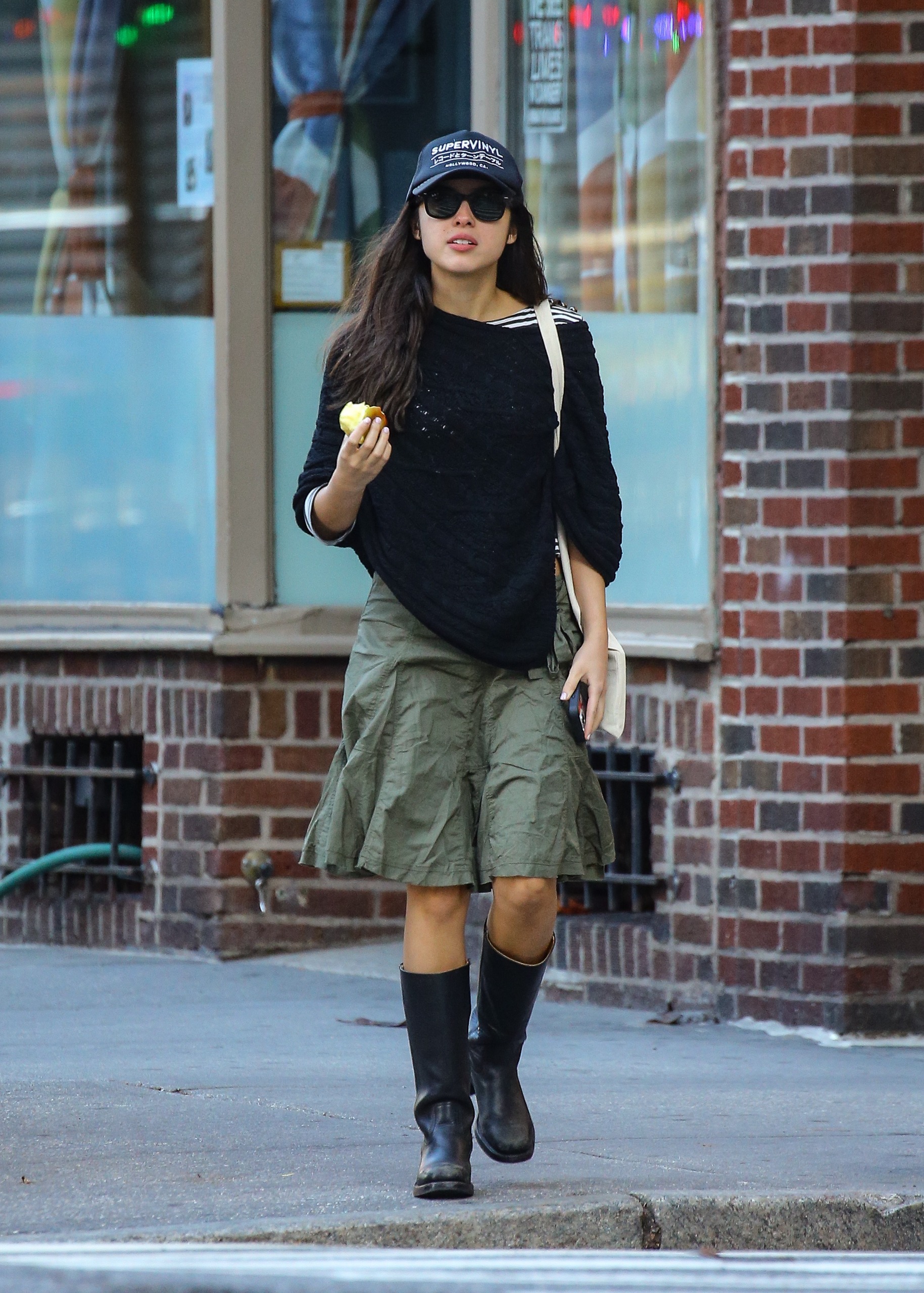 Olivia Rodrigo's poncho, boots, and midi skirt are one of the best celebrity outfits of the week