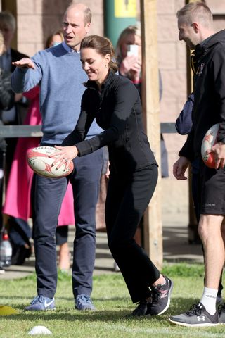 kate middleton plays rugby during trip to northern ireland