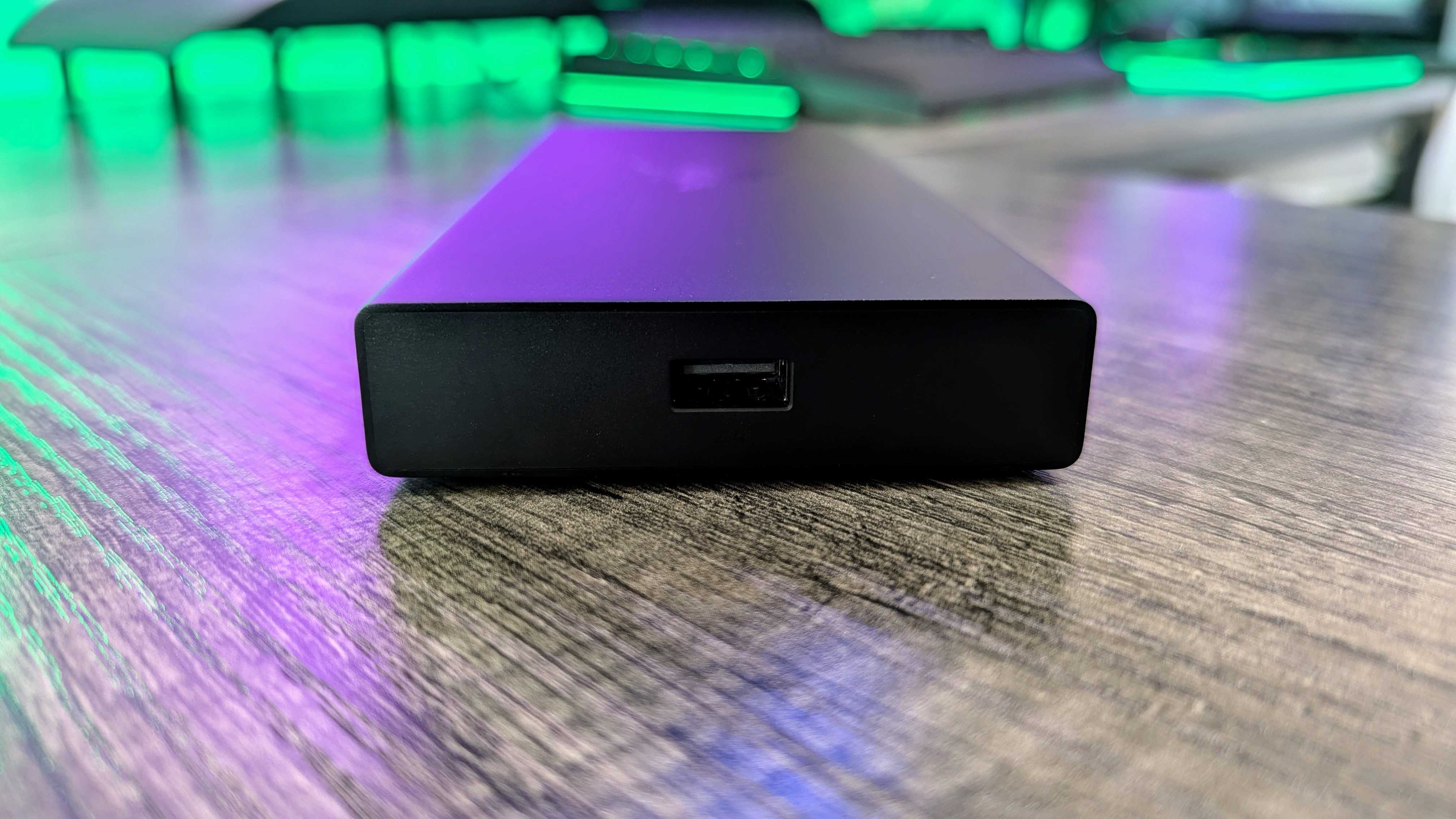 The Razer USB4 Dock as seen from the side, showing the USB Type-A 2.0 port designed for 2.4GHz wireless dongles.