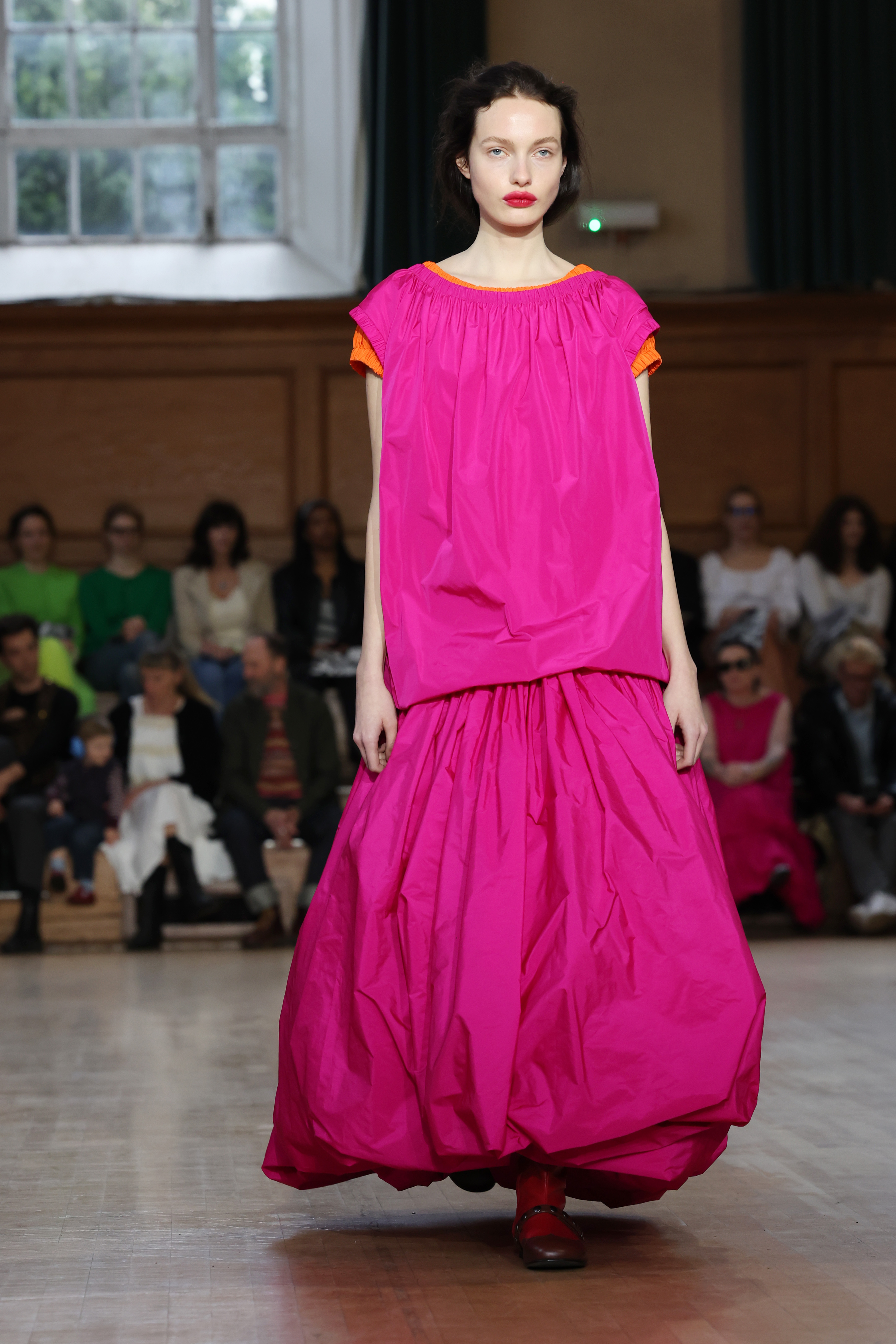 Model wears a puffball skirt on the Molly Goddard AW 24 runway