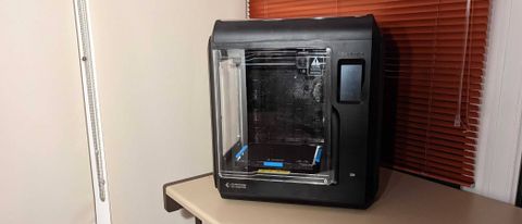 The Adventurer 4 3D printer on a desk