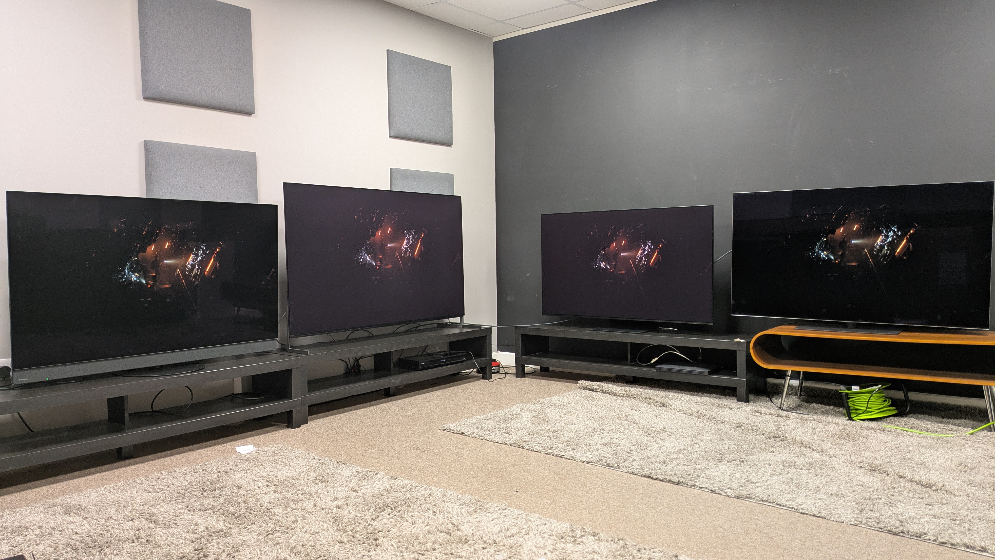 Panasonic Z95B (far left) Sony Bravia 8 II (middle left) Samsung S95F (middle right) LG G5 (far right) with Alien: Romulus on screen in dark room