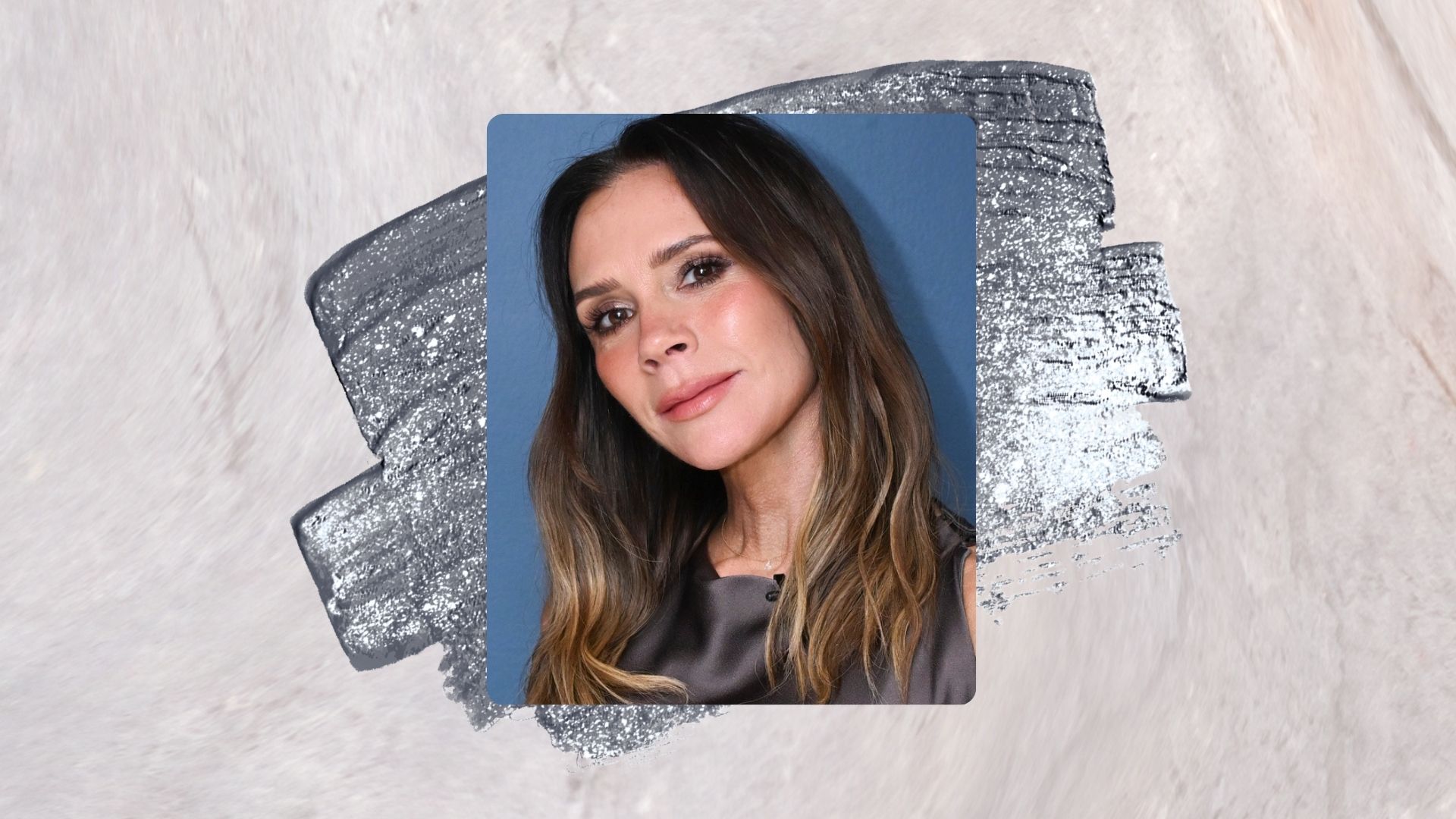 Victoria Beckham poses backstage at the tonight show with Jimmy Fallon in a blue dress and smoky eye makeup