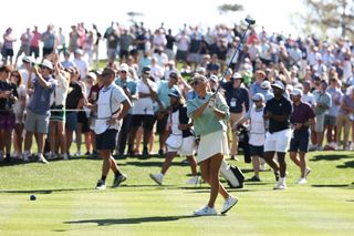 Gabby Golf Girl hits a tee shot at the Creator Classic