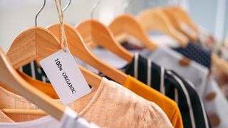 A clothes rail with a label that reads '100% Organic'.