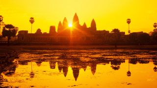 Rise early to enjoy a stunning sunrise at Angkor Wat in Siem Reap, Cambodia