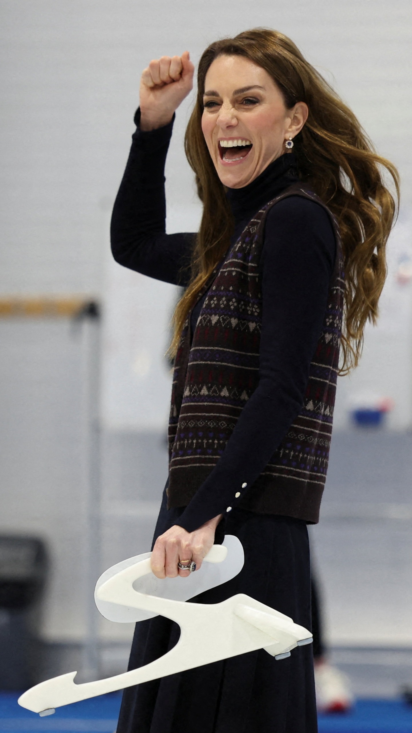 Catherine, Princess of Wales cheers while participating in curling at the National Curling Academy in Stirling, in Scotland on January 20, 2026