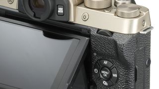 The X-T100 isn't short of dials. There are two on the top and a third dial that just peeps out on the back of the camera above the four-way buttons