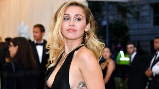NEW YORK, NY - MAY 07: Miley Cyrus attends the Heavenly Bodies: Fashion & The Catholic Imagination Costume Institute Gala at The Metropolitan Museum of Art on May 7, 2018 in New York City.