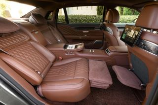 Genesis G90 reclined rear seat and foot rest