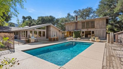 House exterior with blue pool