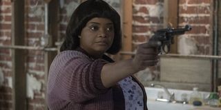 Octavia Spencer as Sue Ann points a gun in Ma