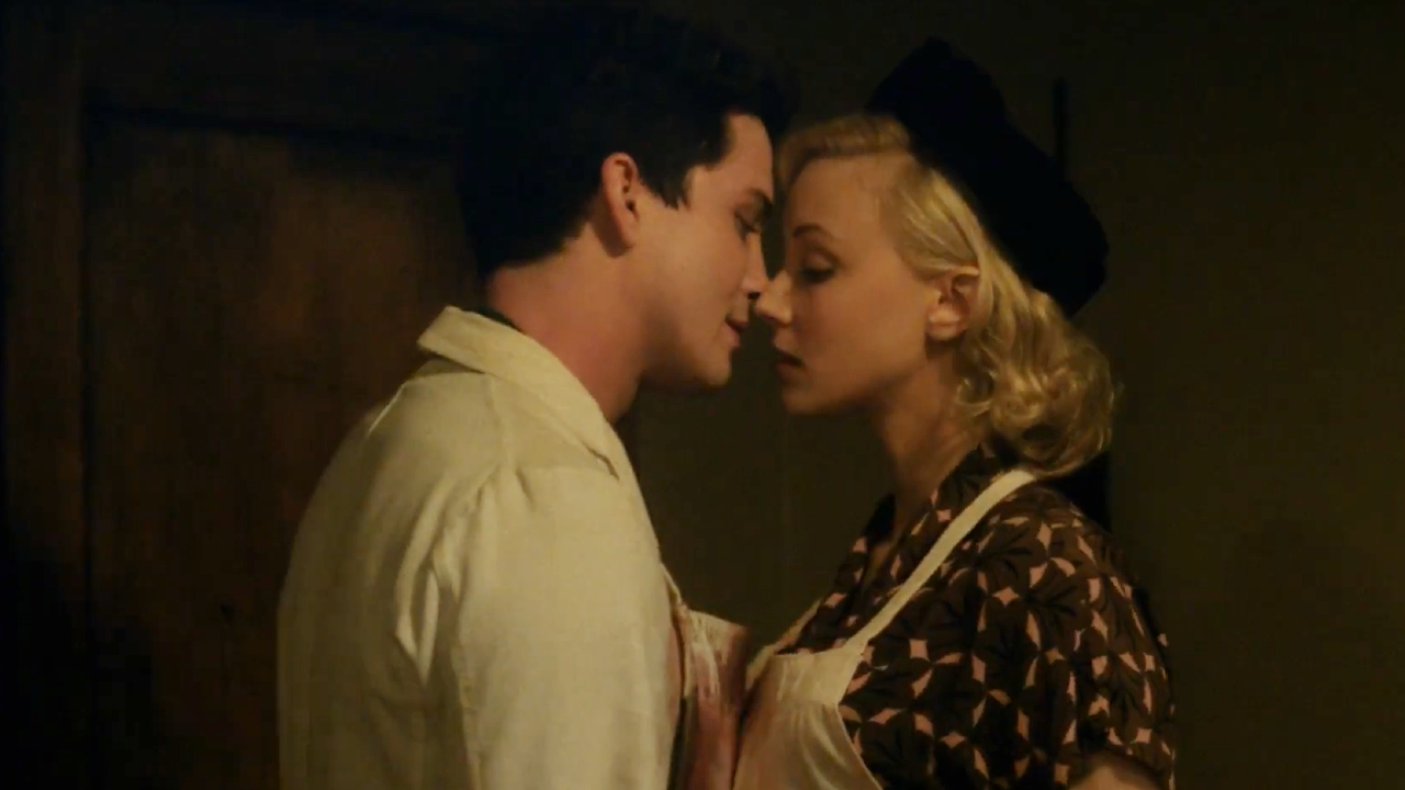 Logan Lerman and Sarah Gadon in Indignation