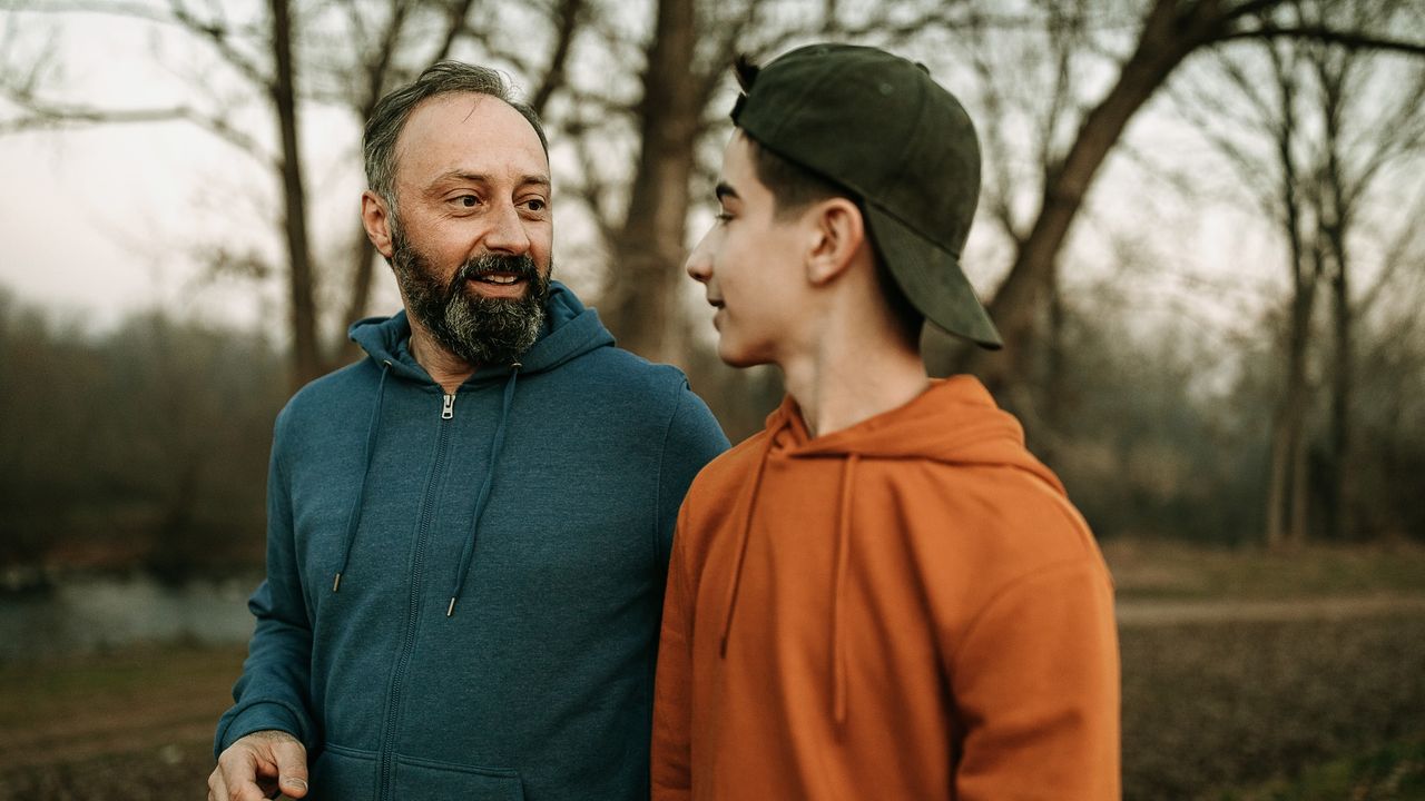 Dad talking to son