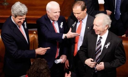 Republican and Democratic senators mingle on Capital Hill