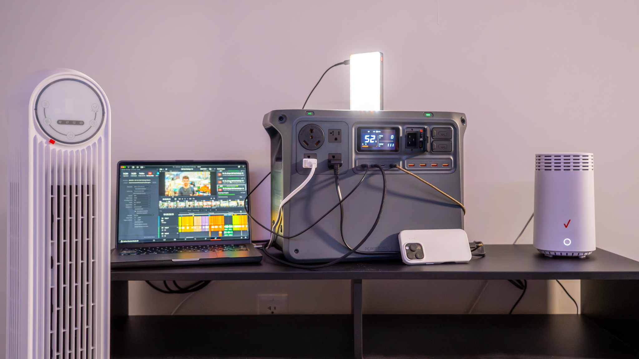 DJI Power 2000 - Fan, MacBook, light, iPhone, Verizon Router plugged in
