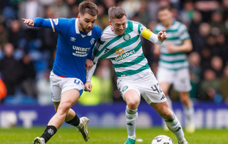 Mikey Moore of Rangers battles with Callum McGregor of Celtic during the William Hill Scottish Premiership match between Rangers and Celtic at Ibrox Stadium on March 1, 2026 in Glasgow, Scotland. 