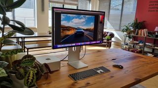 Studio Display on wooden desk