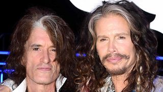 Joe Perry and Steven Tyler at an awards ceremony
