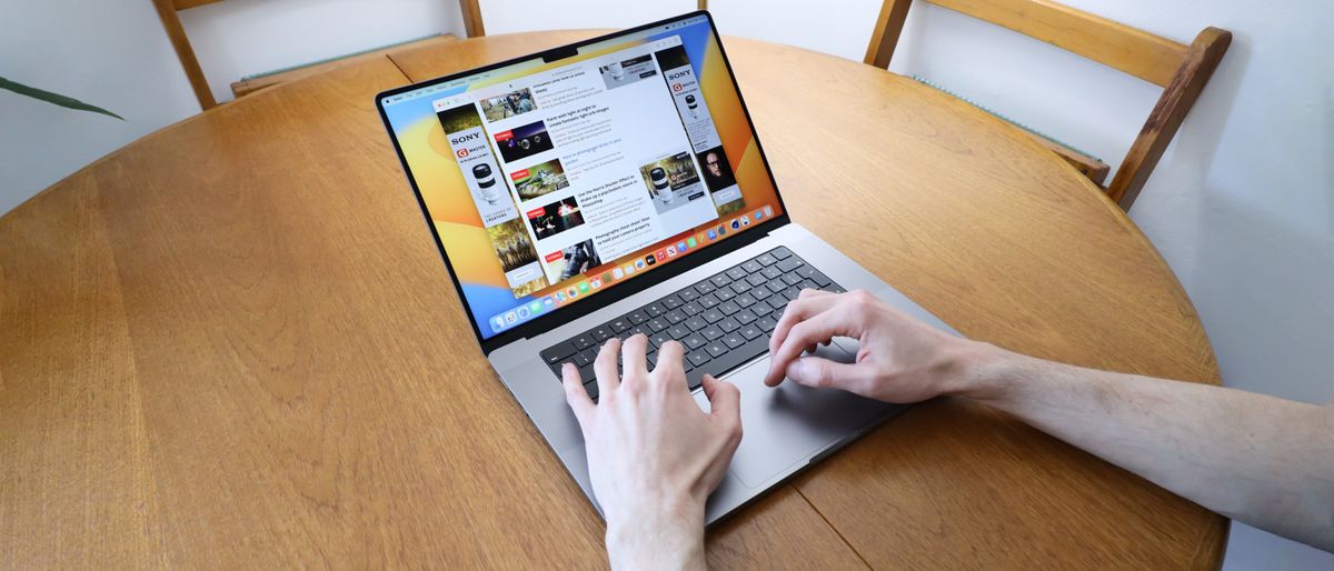 apple macbook pro 16 inch laptop on a wooden table