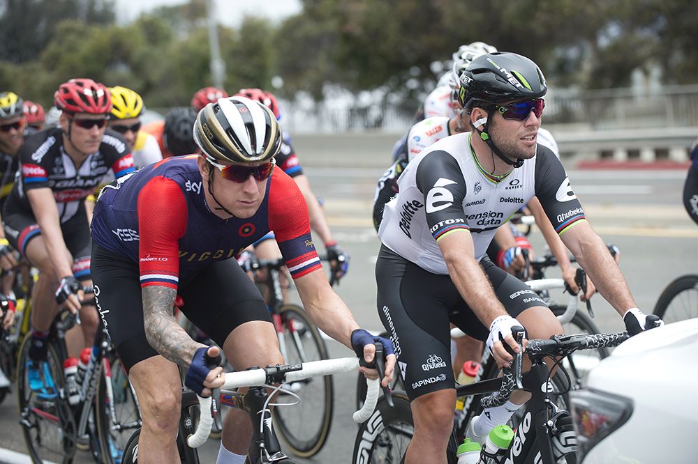Bradley Wiggins and Mark Cavendish riding side-by-side
