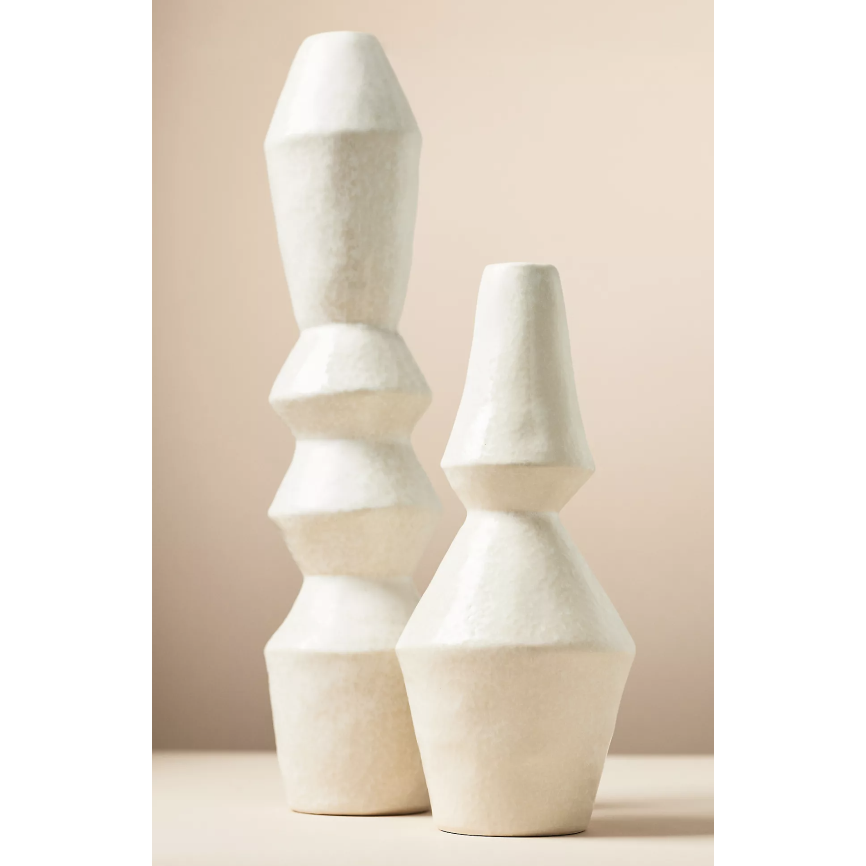 tall white geometric vases