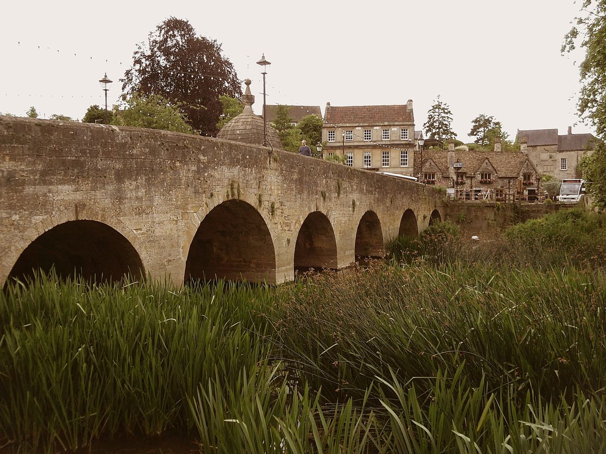 Photograph of a bridge over the River Avon, taken with Camp Snap 2, image is very warm, with a subtle magenta cast