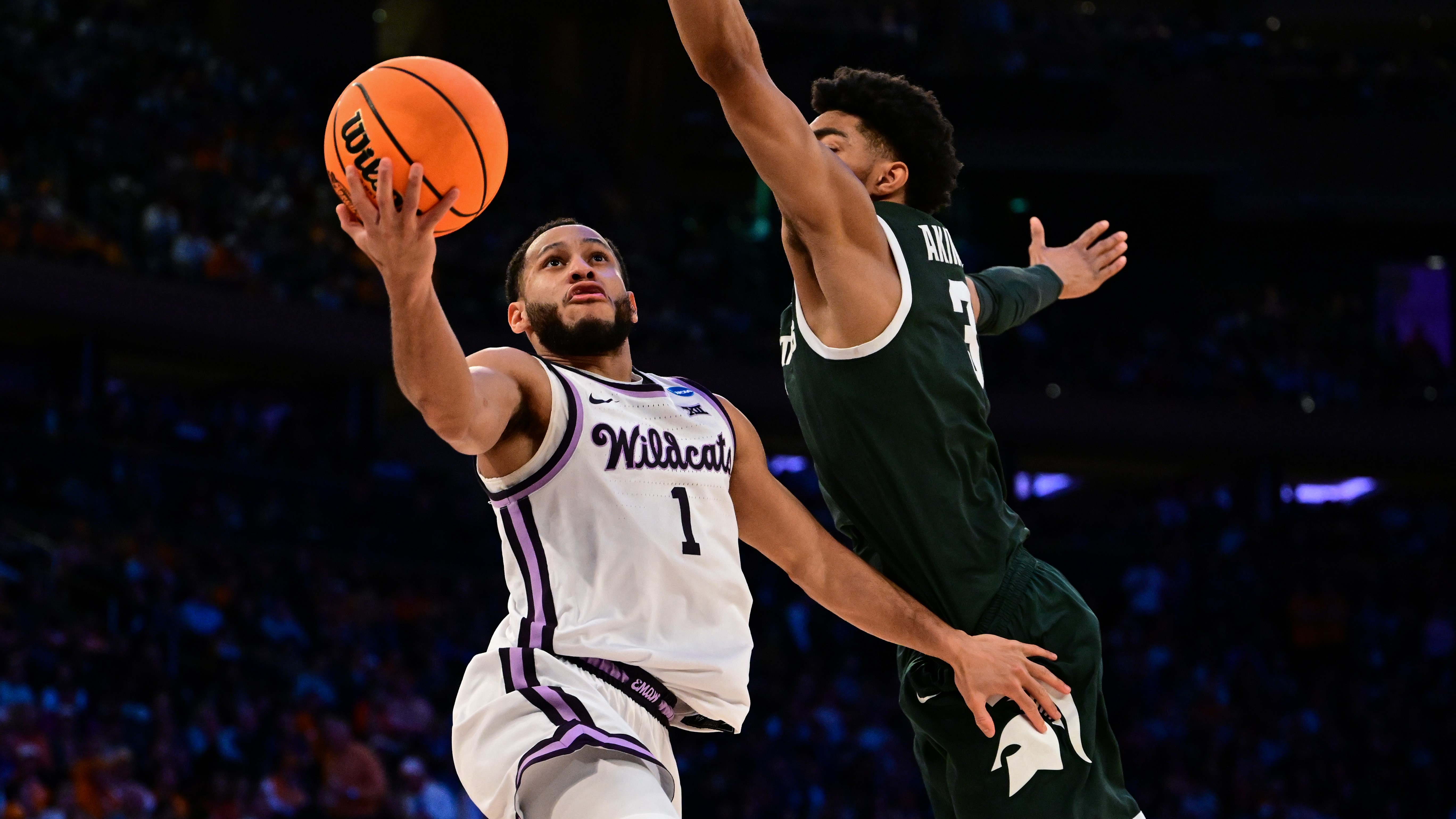 Kansas State's Markquis Nowell takes a lay up