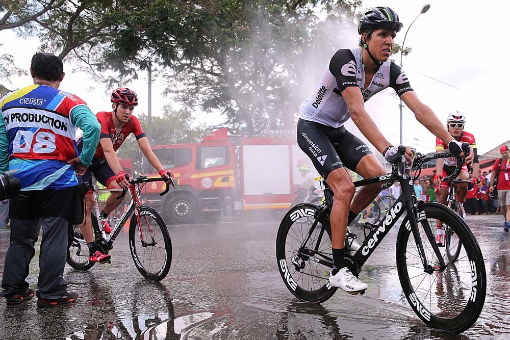 Water sprays help the riders cool down post stage