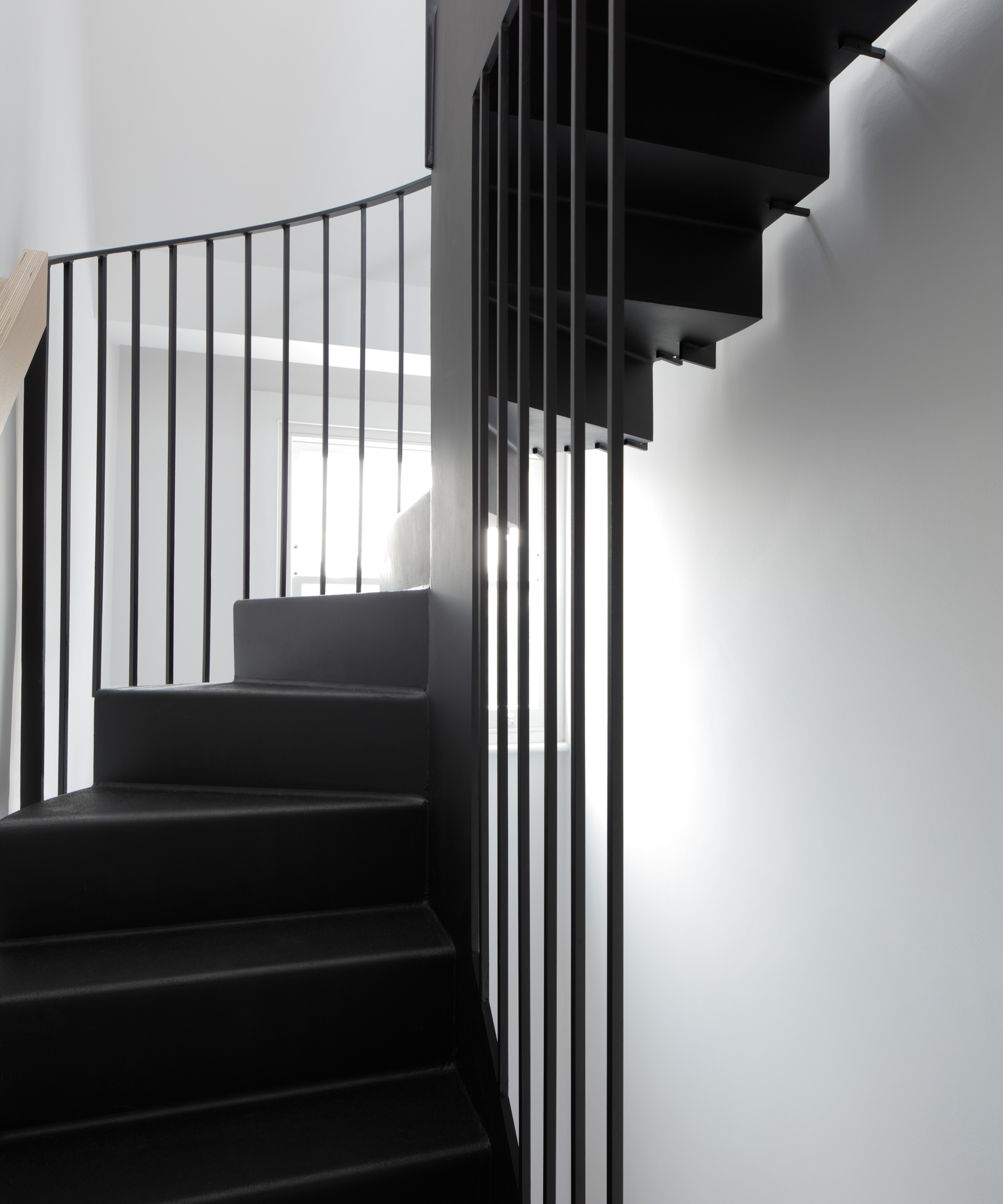 Black metal cantilevered staircase
