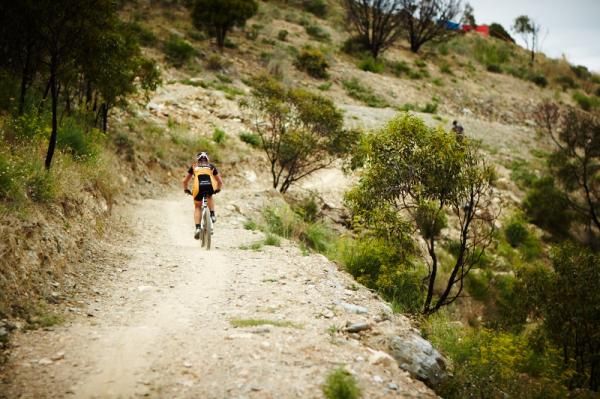 O'Shea rides solo up the climb on the last lap