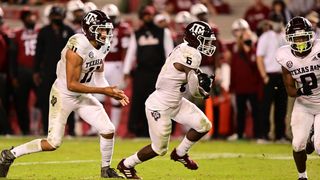 Kellen Mond (11) and Devon Achane (6) of the Texas A&M University Aggies during a regular season game at Williams-Brice Stadium in Columbia, SC on Nov. 7, 2020.