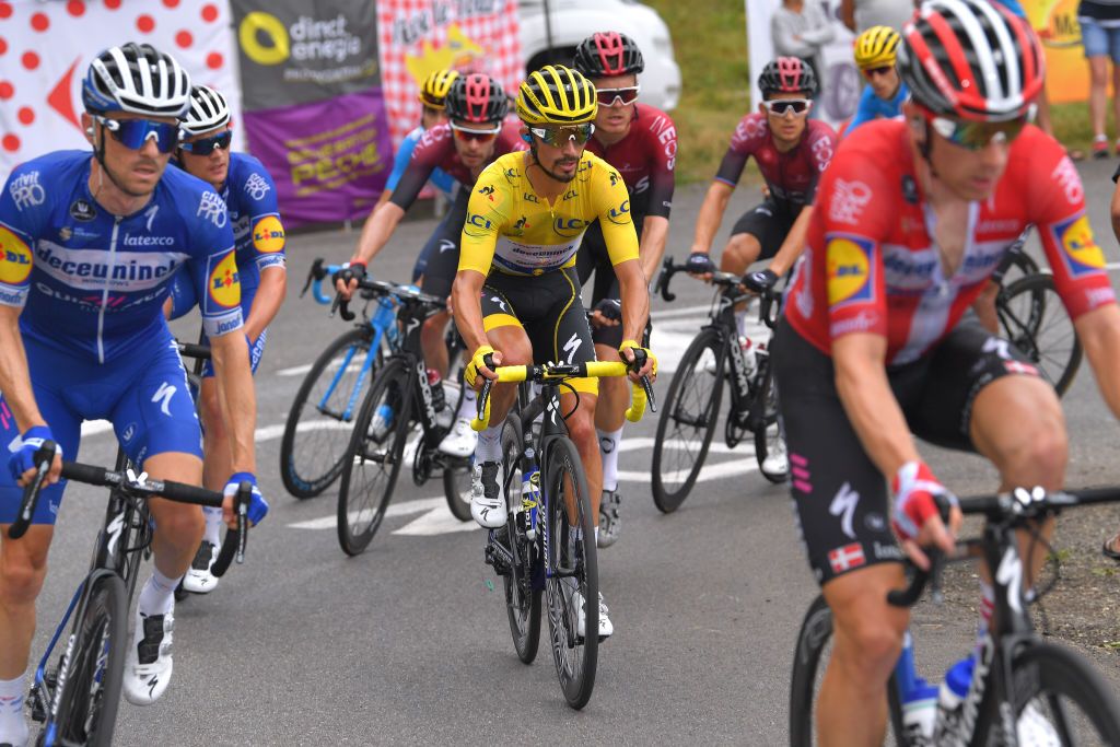 Race leader Julian Alaphilippe in the peloton on stage 15