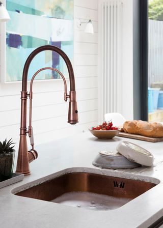 kitchen room with copper sink and tap