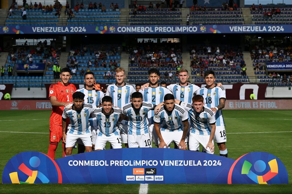 Argentina 2024 Olympics squad Argentine players pose for a picture before the beginning of the Venezuela 2024 CONMEBOL Pre-Olympic Tournament football match between Brazil and Argentina at the Brigido Iriarte stadium in Caracas on February 5, 2024. (Photo by Federico Parra / AFP) (Photo by FEDERICO PARRA/AFP via Getty Images)