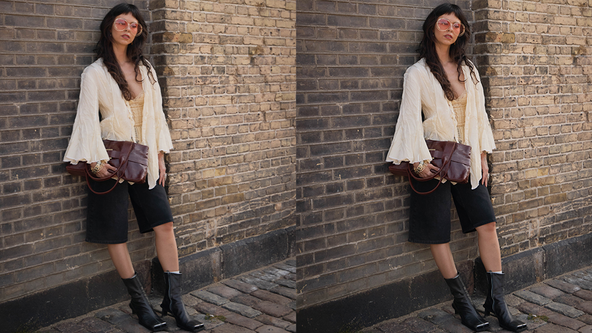 Woman wears white flowy blouse, black long shorts, tall square-toe boots, and a cute cluctch.