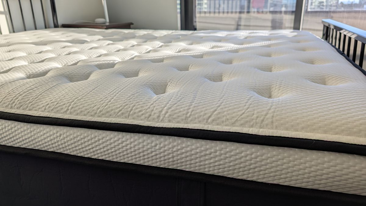 Origin LumbarCloud mattress on a bed frame