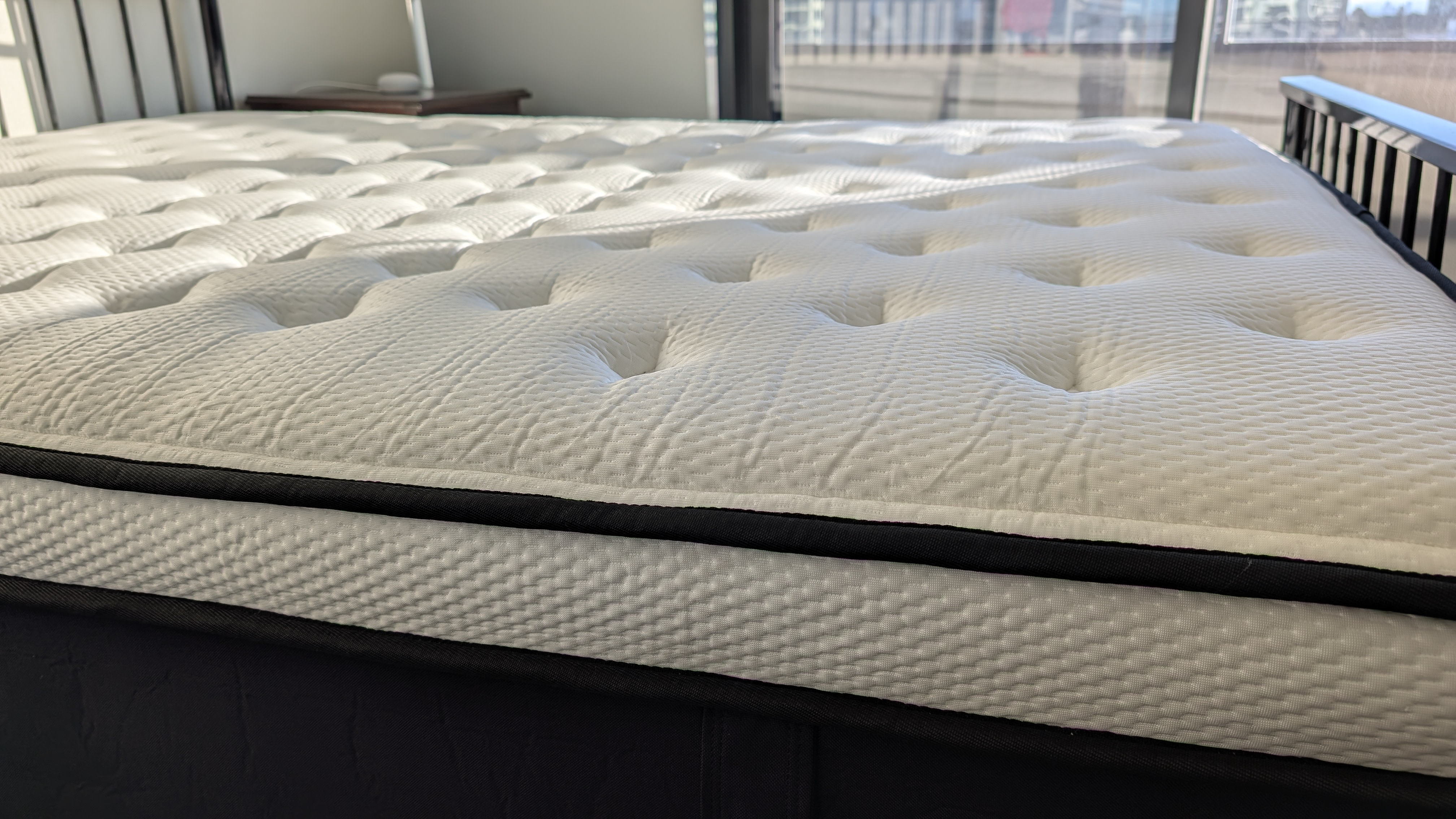 Origin LumbarCloud mattress on a bed frame