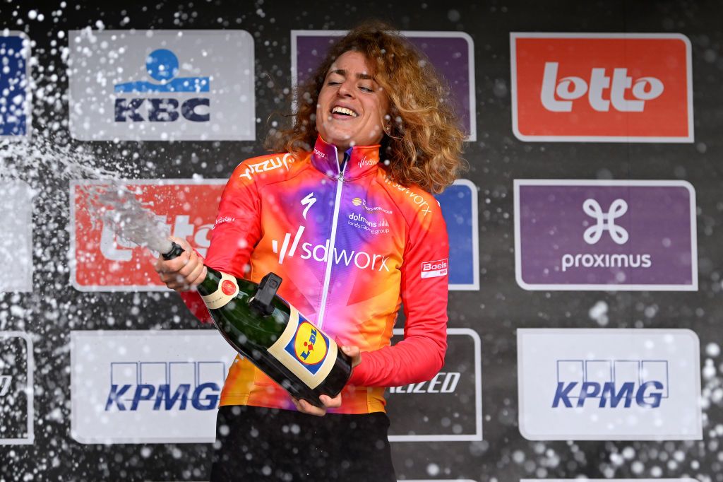 WEVELGEM BELGIUM MARCH 26 Marlen Reusser of Switzerland and Team SD Worx celebrates at podium as race winner during the 12th GentWevelgem In Flanders Fields 2023 Womens Elite a 1625km one day race from Ypres to Wevelgem UCIWWT on March 26 2023 in Wevelgem Belgium Photo by Luc ClaessenGetty Images