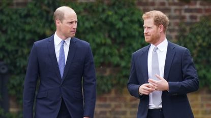 Prince William and Prince Harry, Duke of Sussex arrive for the unveiling of a statue they commissioned of Diana, Princess of Wales, in the Sunken Garden at Kensington Palace