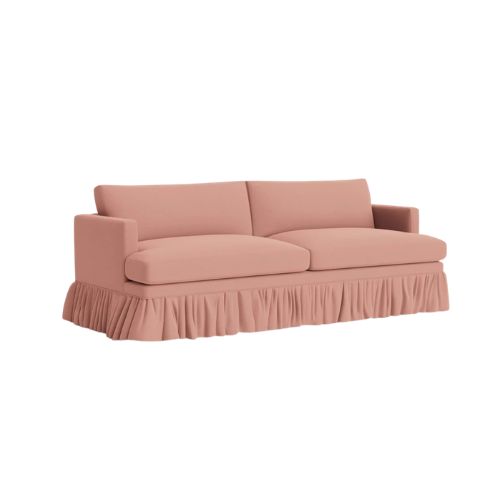Pink ruffled sofa