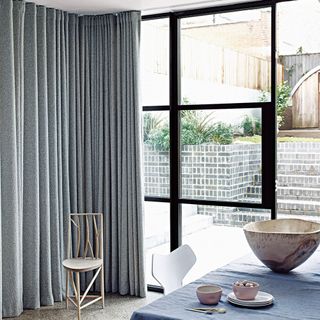 Outdoor glazing with grey curtains