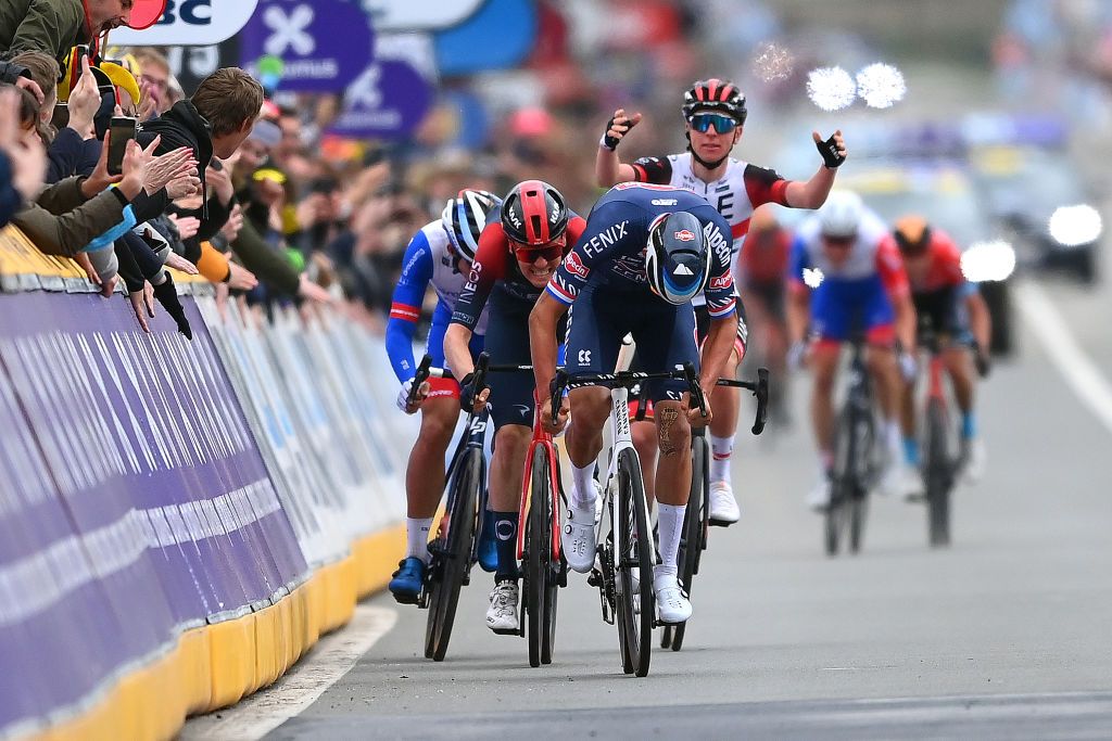 OUDENAARDE BELGIUM APRIL 03 Mathieu Van Der Poel of Netherlands and Team AlpecinFenix Dylan Van Baarle of Netherlands and Team INEOS Grenadiers Valentin Madouas of France and Team Groupama FDJ and Tadej Pogacar of Slovenia and UAE Team Emirates sprint at finish line during the 106th Ronde van Vlaanderen Tour des Flandres 2022 Mens Elite a 2725km one day race from Antwerp to Oudenaarde RVV22 WorldTour on April 03 2022 in Oudenaarde Belgium Photo by Tim de WaeleGetty Images