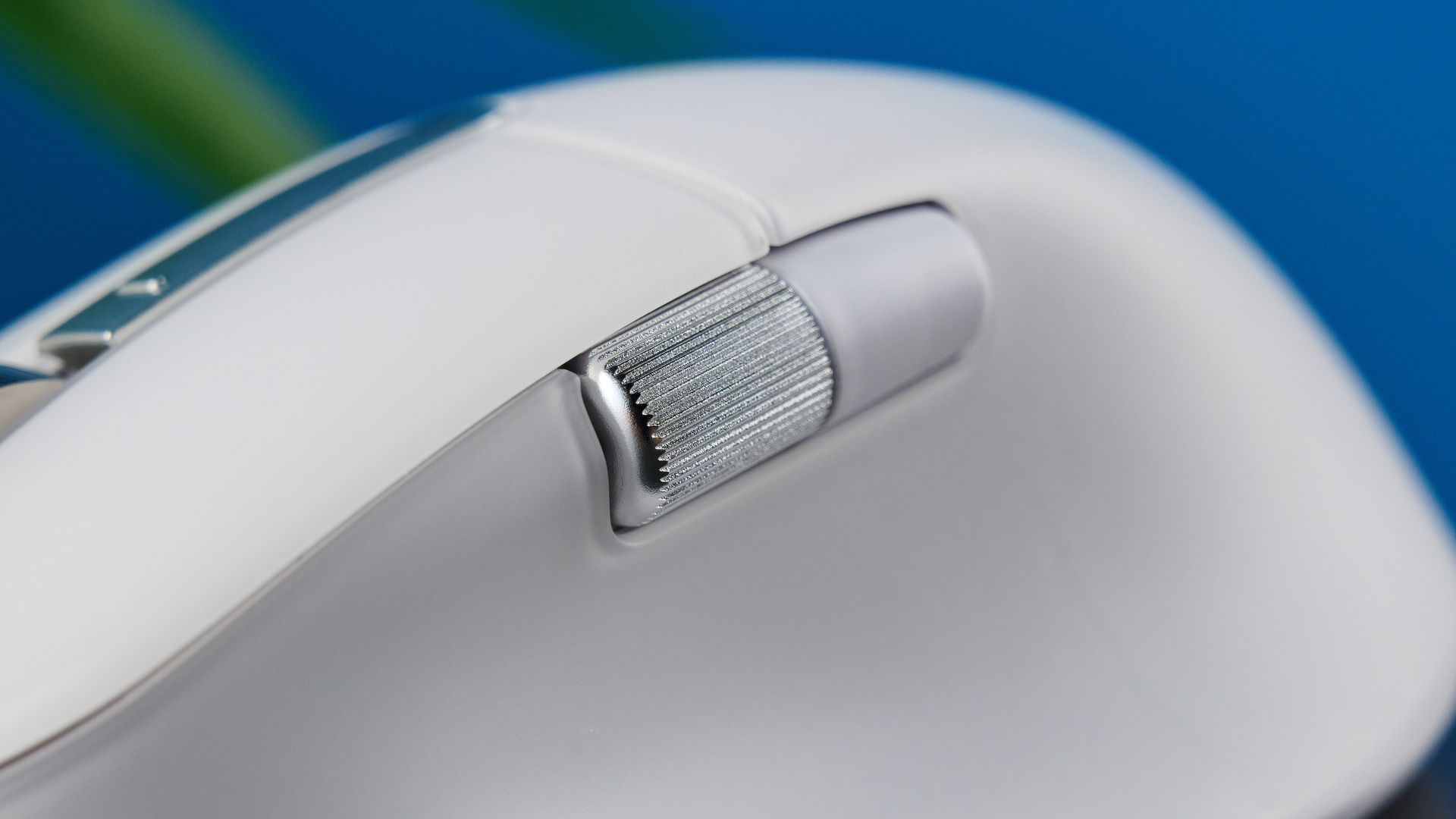 A white BenQ INFTYLAB M Mouse PS01 mouse