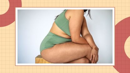 Plus size woman with fat legs sitting on stool. Oversized woman wearing lingerie with cellulite on thighs over white background.